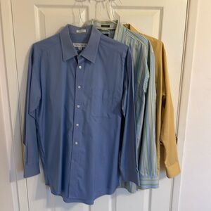 3 pack of men’s dress shirts size 17 34-35.  All EUC with a left front pocket.